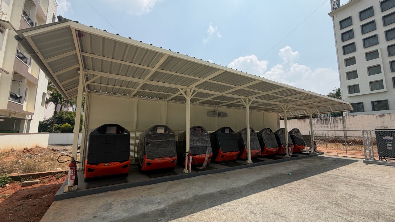 Battery swapping station infrastructure under a steel canopy
